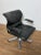 A Saporiti Italia “Onda” executive swivel desk chair in leather with polished steel swivel base designed by Giovanni...