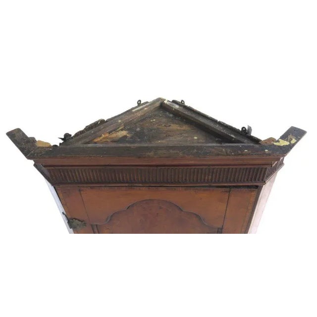 English Fruit wood Hanging corner cupboard boxwood stringing on shaped panelled door with center urn and flower inlaid...