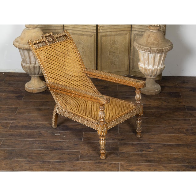 Early 20th Century Anglo-Indian Inlaid Plantation Chair with Scrolling Foliage and Extending Arms For Sale In Atlanta - Image 6 of 12