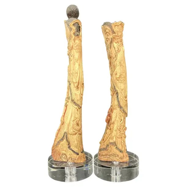 Hand-Carved Bone Chinese Ancestral Figures, a Man and a Woman. The matched figures stand elegantly on a custom acrylic...