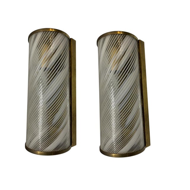 Pair of Murano Glass Wall Sconces, Italy, 1970s Elegant pair of Italian wall sconces crafted in Murano glass, featuring...