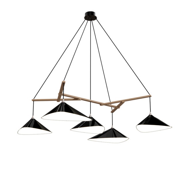 Emily is a series of handmade sheet steel lampshades in various finishes and spatial arrangements. _ Emily was inspired by...