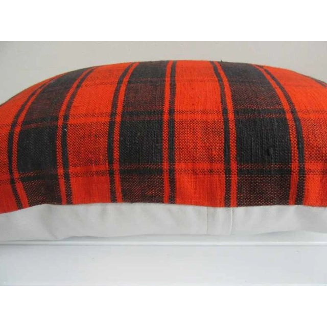 This is a pillow cover made from a vintage kilim rug. The piece was properly washed and ready to use. Pillow inserts not...