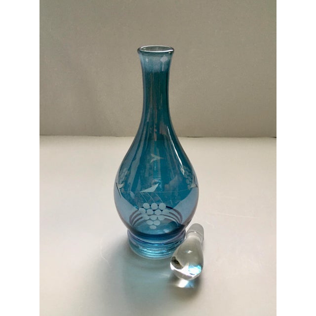 A gorgeous blue glass drinks set in excellent excellent condition. Perfect for an elegant dining experience. Decanter...