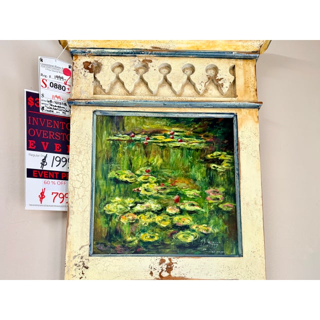 Charming cream‑painted trumeau mirror featuring a distressed, timeworn finish and a beautifully textured original, signed...