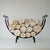 Vintage circa 1990s firewood log holder forged in black coated wrought iron. Scroll end details and wide opening to make...