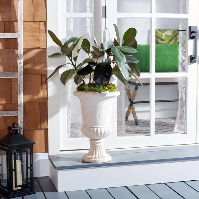 Bring a touch of elegance and grandeur to any outdoor space with our Paul planter. The rim of our graceful urn planter is...