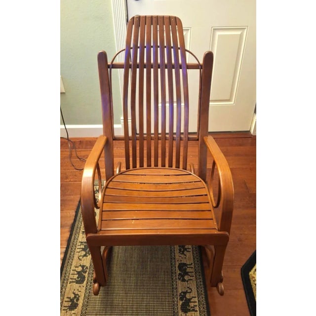 Handmade Hudson Valley Rocking Chair made of cherry in pristine condition.
