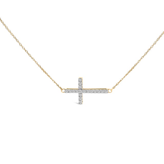 Imbued with a subtle splendor, this exquisite pendant necklace presents a modern twist on spiritual symbols by aligning a...