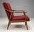 A pair of sculptural mid century armchairs produced by TON in former Czechoslovakia during the 1960s. The chairs feature...