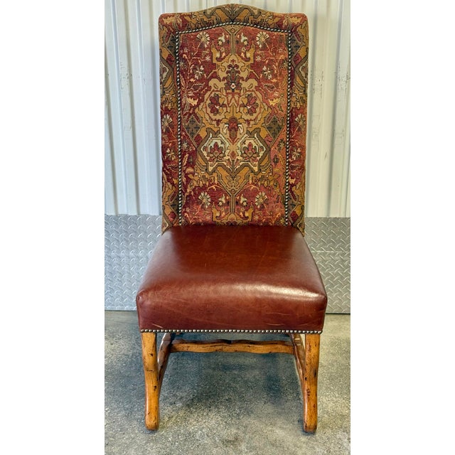 Stunning set of 6 Spanish revival dining chairs. Features high end construction and generous proportions. Striking...