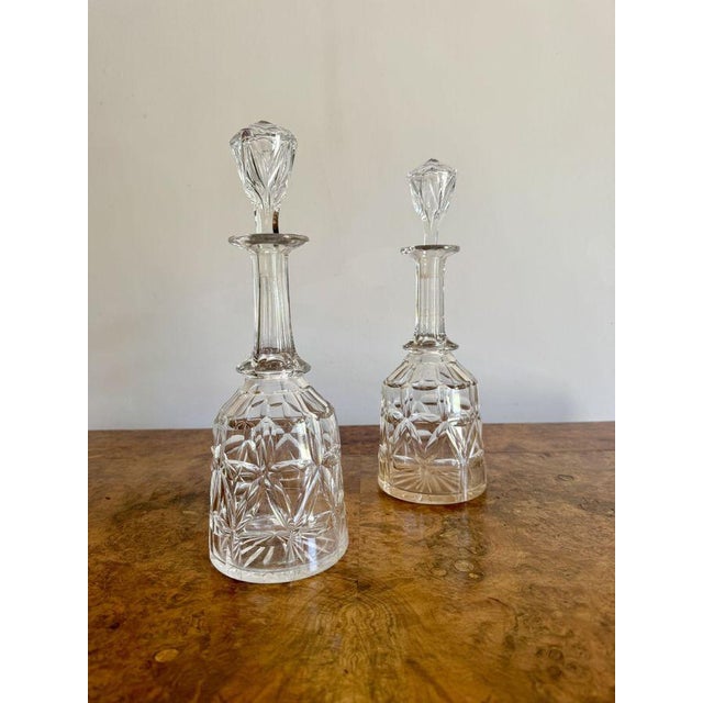 Pretty pair of antique Edwardian decanters, having a quality pair of antique Edwardian decanters with a bell shaped cut...