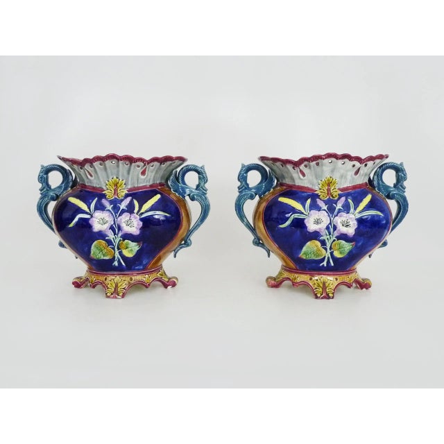 Pair of antique Art Nouveau slip planters with dragon handles Magnificent pair of planters with floral motifs on both...