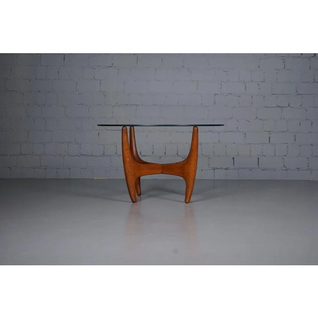 Attractive solid teak frame with surface glass plate.