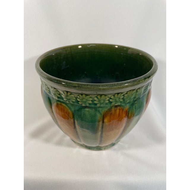 A lovely 7.5" diameter ceramic art pottery jardiniere attributed to Weller Art Pottery. Circa 1900-1920s. Although...