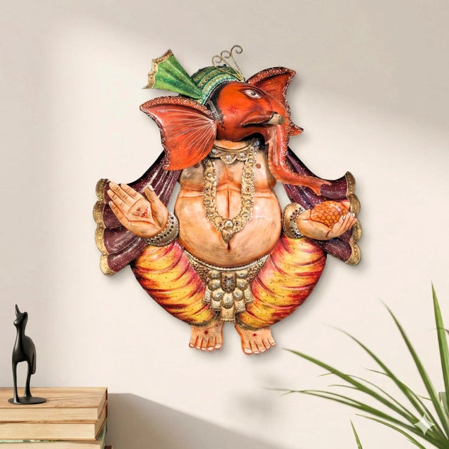 Invite the divine energy of prosperity and wisdom into your home with our Vibrant 36"" Tall Ganesha Metal Wall Art. This...