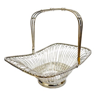 Mid 20th Century Victorian Style Silver-Plated Wirework Centerpiece Basket With Folding Swing Handle For Sale