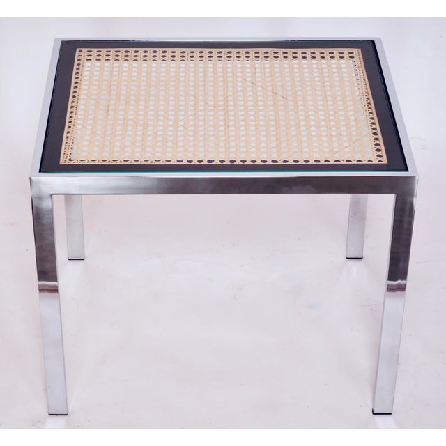 Mid Century Modern Chrome and Cane Occasional Table in the Style of Milo Baughman is in good condition ready to pair up...