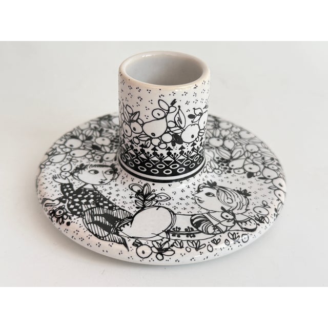 Candle holder from the poetic ceramics series by Björn Wiinblad for Rosenthal from 1979 This piece has an attribution...