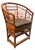 A vintage rattan Brighton Pavilion chair. Horseshoe shape. Intricate tortoise rattan fretwork design to front and...