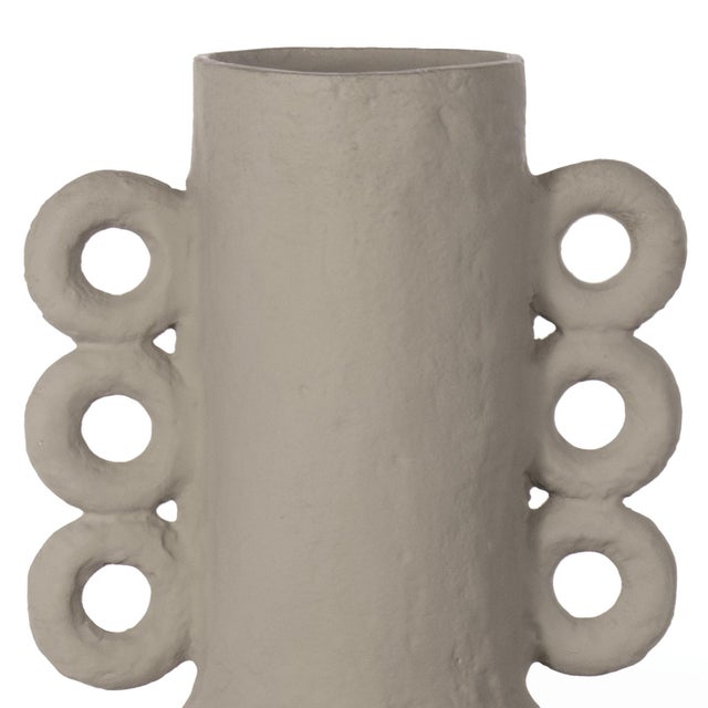 Our Chandra Vase is dimpled with natural, paper mache texture. Finished in matte brown/grey, the Chandra harkens to...