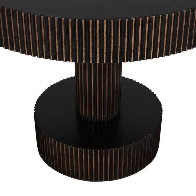 The Stringata Table in Hand Rubbed Black with Light Brown Trim offers a refined blend of elegance and craftsmanship. Made...