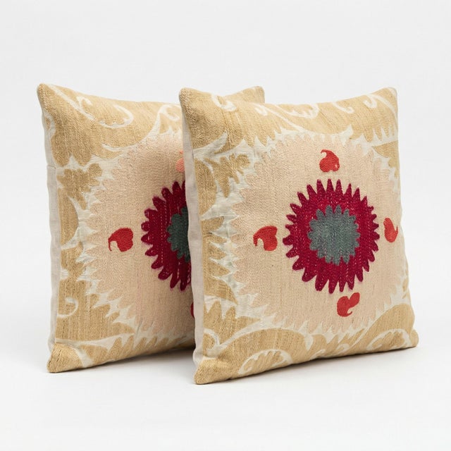 This beautiful 26'' x 27'' & 27'' x 24'' hand-embroidered Suzani pillow cover set was made from authentic Uzbek cotton...