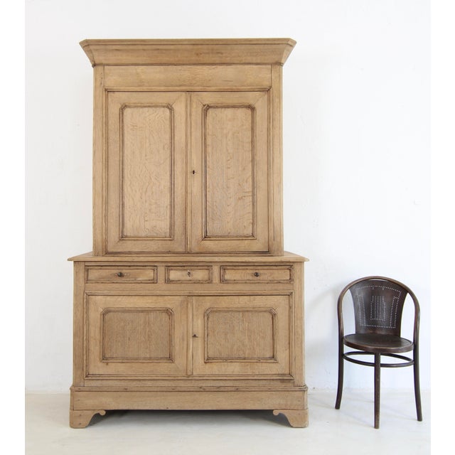 Late 19th century Louis Philippe-style buffet cabinet. Crafted from solid oak. Ready for everyday use. Two-part oak body...
