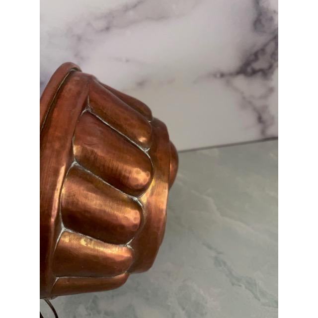 Se]weet vintage mid-century copper baking or bread mold. Features a pear and leaf design on front. With hanging hook at...