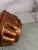 Se]weet vintage mid-century copper baking or bread mold. Features a pear and leaf design on front. With hanging hook at...