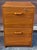 A Mid-Century Danish Modern Teak rolling and Locking Two-Drawer File Cabinet. Dimensions: 17.75" in width, 20" in depth...