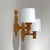 Swedish Mid-Century Design Wall Lights, 1960s to 1970s The sconces feature intricately turned Swedish pine wood backplates...
