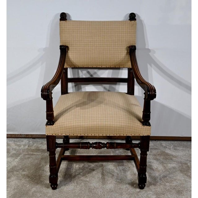 Walnut chair, known as "Bout de table" by its shallow depth, in Renaissance style, covered with a checkered canvas,...