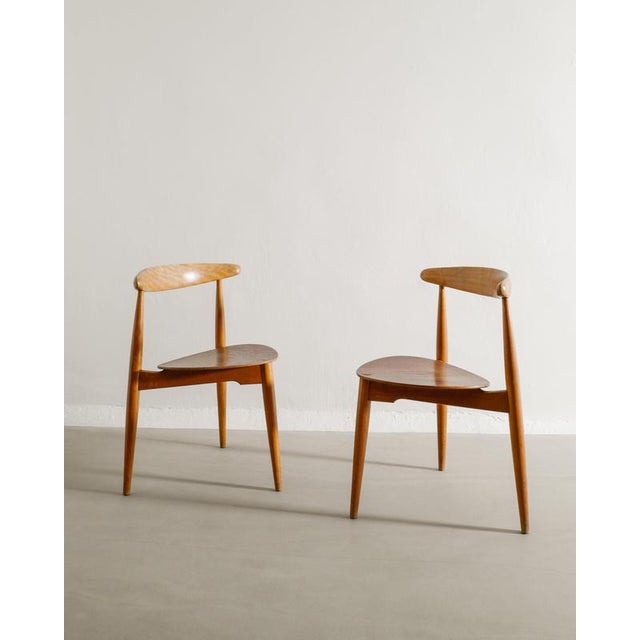 Rare set of eight three legged danish mid century "fh 4103 heart" wooden dining chairs in stained oak with teak seats by...