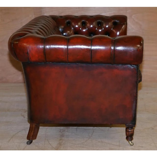Vintage Oxblood Bordeaux Leather Chesterfield Club Sofa on Turned Legs For Sale - Image 13 of 18