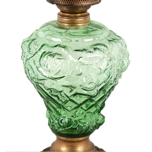 This art glass converted oil lamp is a striking blend of historic character and modern convenience. The lamp features...
