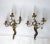 French Baroque bronze, leafy vine motif, three-arm wall sconces with candlestick lights. Wired and in working condition....