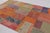 Handwoven in cotton and wool, this 7x10 vintage Turkish patchwork rug, circa 1950-1960, is a striking example of mid-...