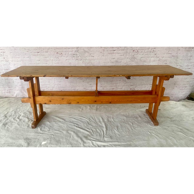 Danish Rustic Pine Dining Table. Table showcases the warmth, simplicity, and honest construction associated with...