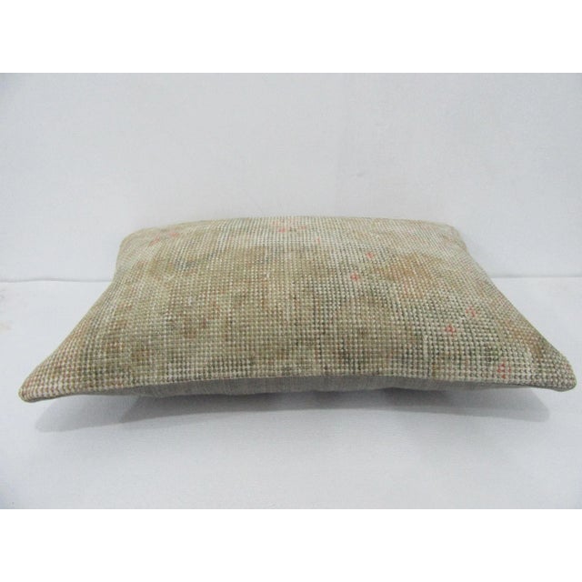 Decorative pillow cover made from a vintage Turkish handknotted rug. Backed with good quality cotton fabric. Pillow...