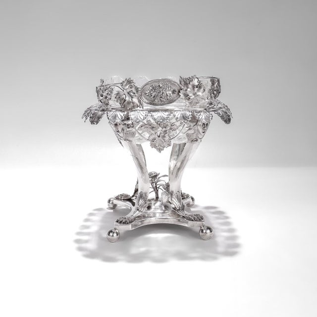 A fine Neoclassical footed basket or confectionary stand. By Georg Drewes. In solid silver with a cut glass insert....