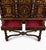 This is a late 19th or early 20th century English carved walnut barley twist cabinet on stand. The cabinet face features...