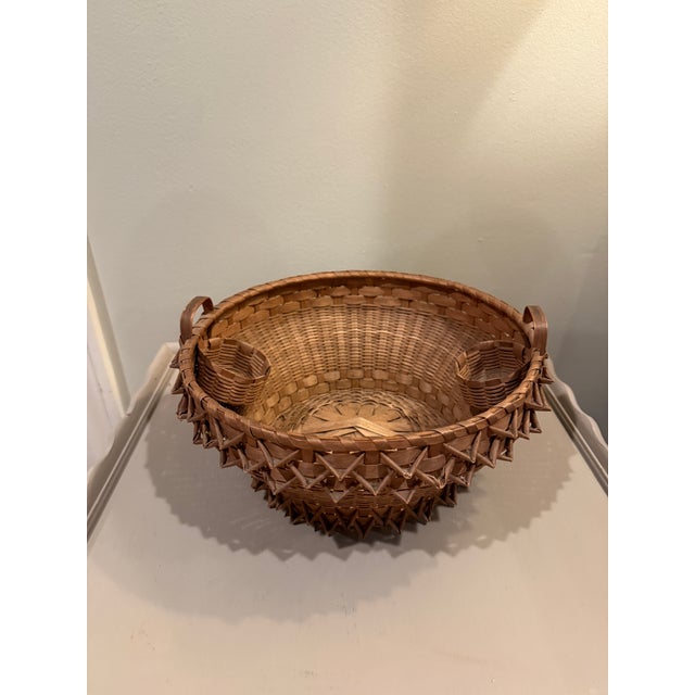 Stunning and Rare Early 20th Century double handled porcupine coil curl basket with two miniature interior Pockets. This...