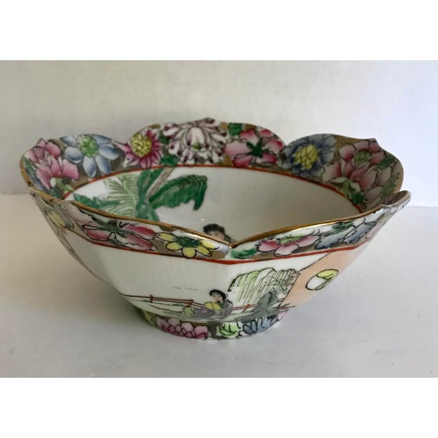 Here is a beautiful bowl hand-painted and made in China from the early mid-century. It is signed on the bottom, as shown....