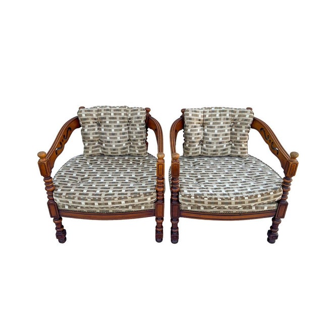 A set of two classic Giorgetti armchairs in Art Deco style from the 1975 Gallery collection. These elegant chairs are...