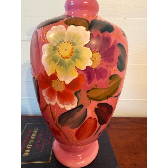 This is a match pair of Bristol glass vases meaning the flowers are positioned opposite of one another on each vase. The...