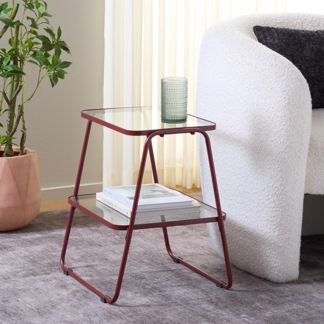 Step up your interior decor game with our Accent Tables. Stylishly crafted from sturdy iron and tempered glass, these...