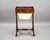 A decorative Victorian mahogany work table, raised on elegant pierced end supports with shaped stretcher and scrolling...
