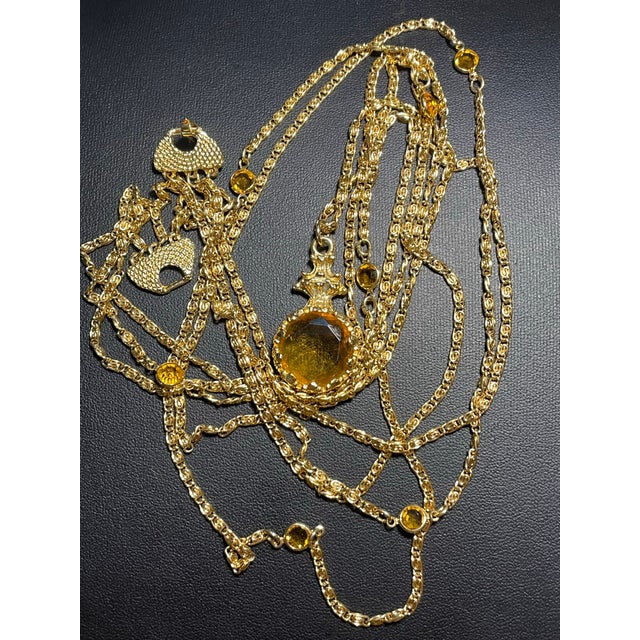 This mid-century modern (MCM) Victorian Revival multi-strand necklace by Goldette features a striking, enormous faceted...