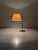 Hollywood Regency Brass Table Lamp Stylish Hollywood Regency brass table lamp. The lamp's height and tilt are adjustable,...